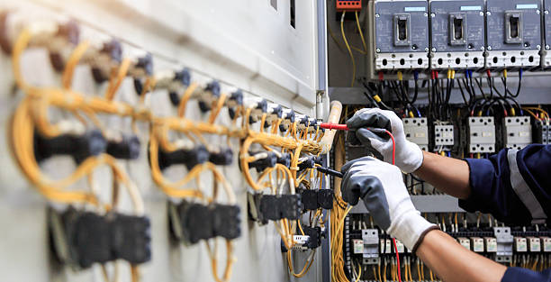 Professional Electrician technician working in Bogata, TX